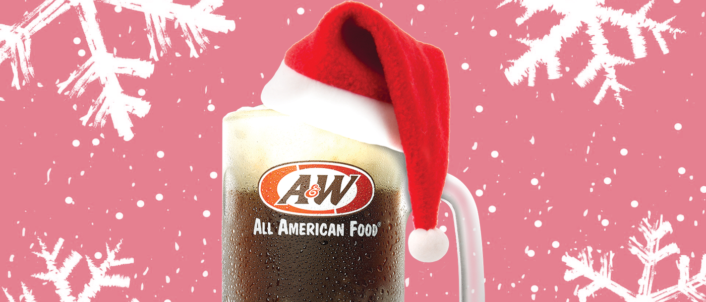 Light pink background with snowflakes. Mug of A&W Root Beer in the center wearing red Santa hat